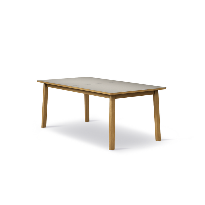 Klassisk Ana spisebord fra Fredericia Furniture med lamint bordplade. Perfekt element til spisestuen.