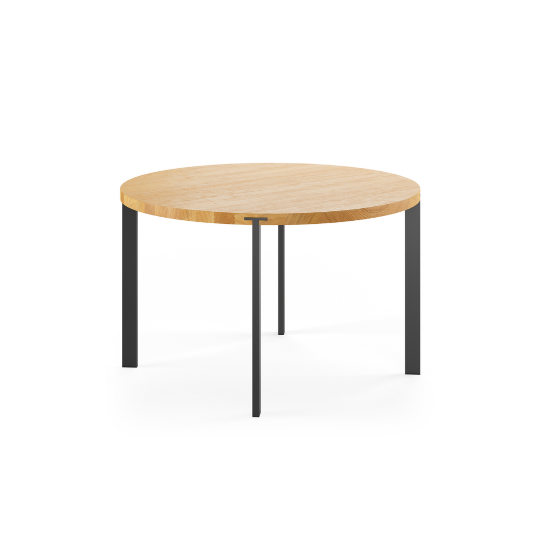 Rundt spisebord fra Naver Collection. Bordet har en bordplade af træ og bordben i rustfrit stål, som fås i forskellige farver.