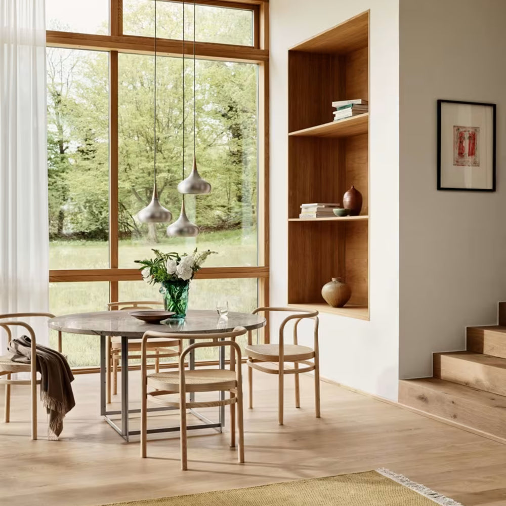 PK15 armchair af Poul Kjærholm for Fritz Hansen i spisestue