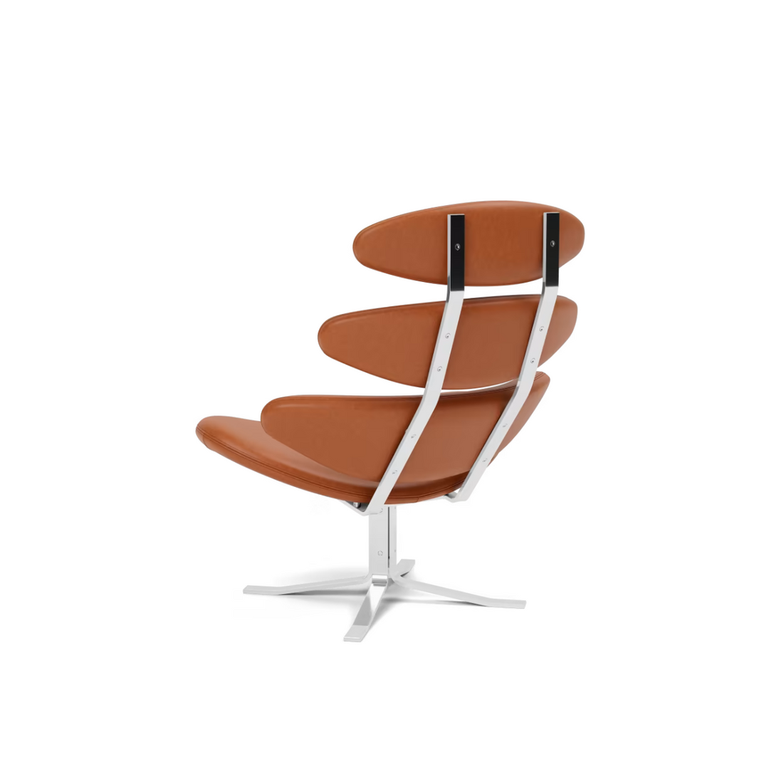 Klassisk Corona loungestol fra Fredericia Furniture i læder. Bringer en ekstra siddeplads ind i stuen, både med en flot design og god komfort. Designet af Poul M. Volther.