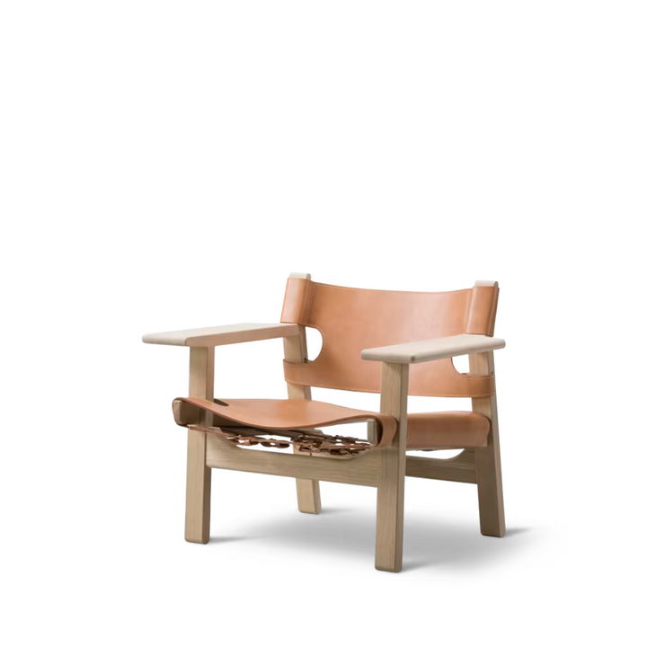 Den Spanske Stol er et af Børge Mogensens mest ikoniske møbler. Dansk design fra 1958. Perfekt som eksta siddeplads i stuen. 