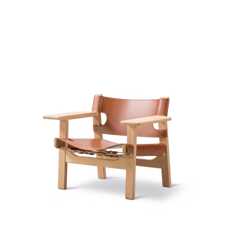 Den Spanske Stol er et af Børge Mogensens mest ikoniske møbler. Dansk design fra 1958. Perfekt som eksta siddeplads i stuen. 