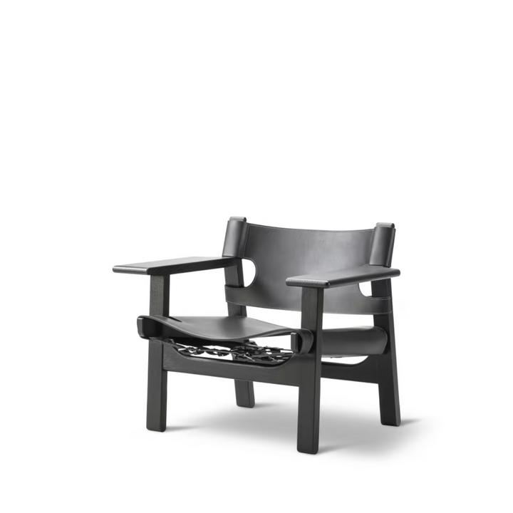 Den Spanske Stol er et af Børge Mogensens mest ikoniske møbler. Dansk design fra 1958. Perfekt som eksta siddeplads i stuen. 